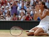 фото France's Amelie Mauresmo at Wimbledon in 2006. 